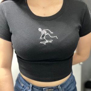 Black Forever 21 crop top with skeleton riding a skateboard